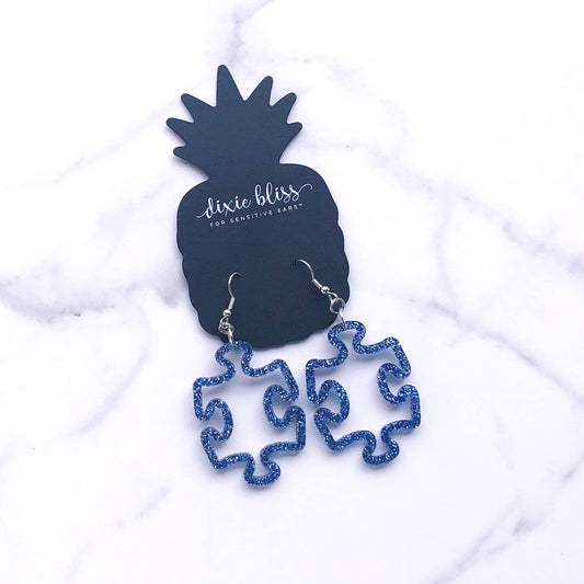 Puzzle Piece Outline in Blue Glitter - Dixie Bliss - Dangle Earring